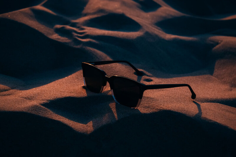 Dark sunglasses in a badly lit desert