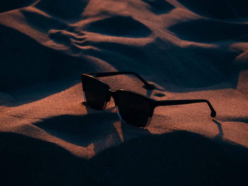Dark sunglasses in a badly lit desert